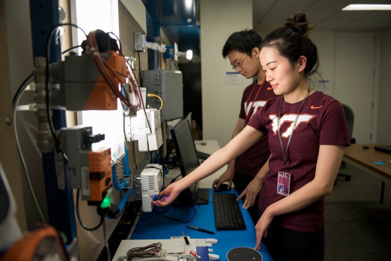 woman working on electronics