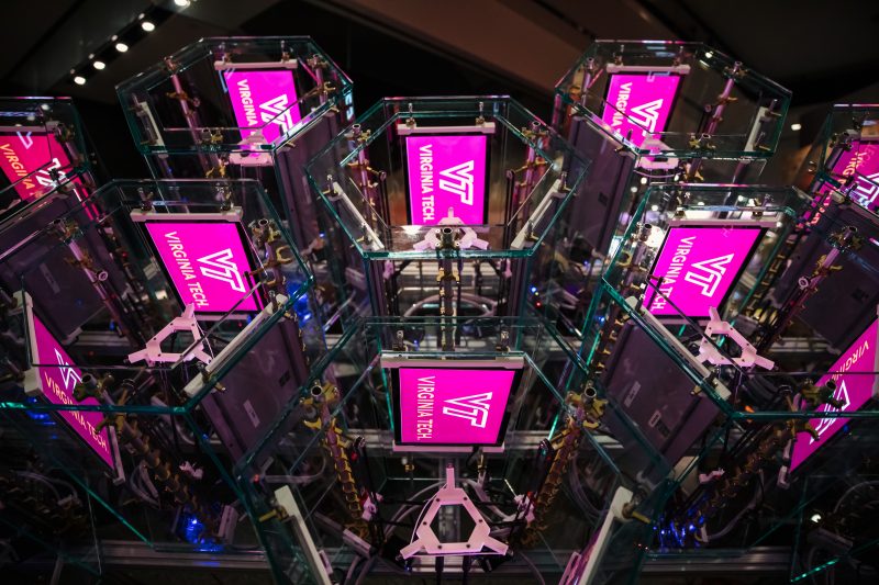 several computer screens displaying "Virginia Tech" logo