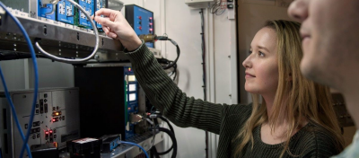 female student conducting research
